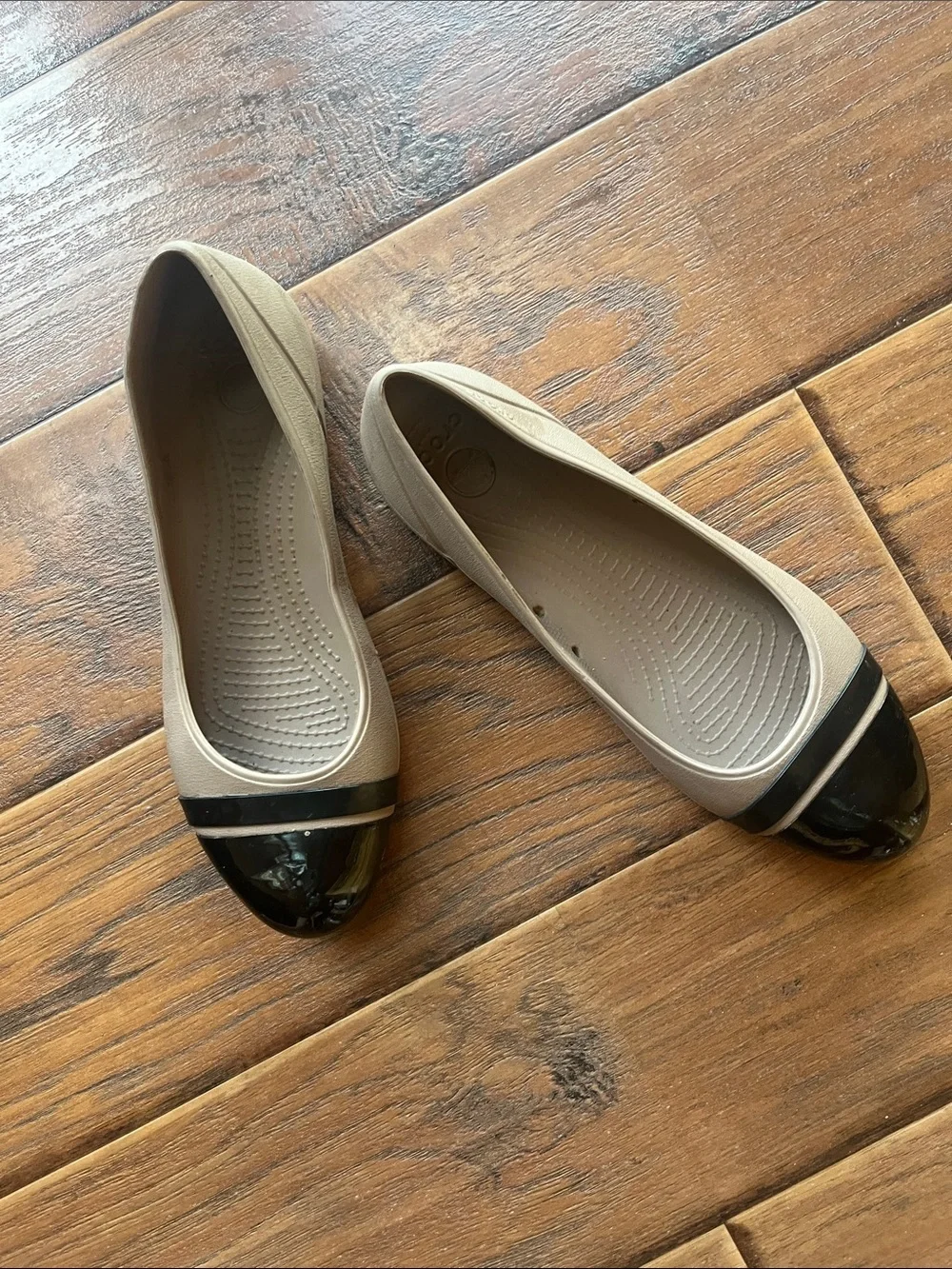 CROCS Beige Flats with Black Patent Cap Toe